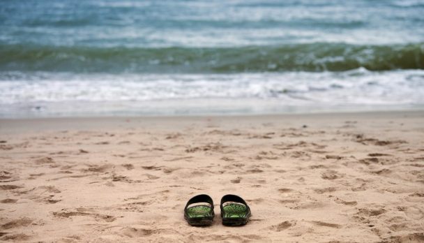 Sandals,On,Sandy,Beach,,Beautiful,Baltic,Sea,Background,,Nobody.,Black